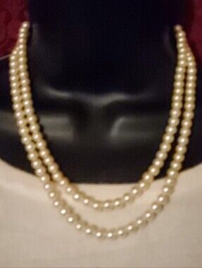 Elegant Triple-Strand Cream Pearl Necklace